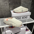 NIKE MIND 001 BEIGE